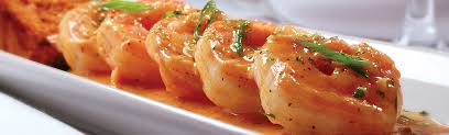 Ruth's Chris Steakhouse signature dishes Barbecued ShrimpSizzling Crab CakesChilean Sea Bass